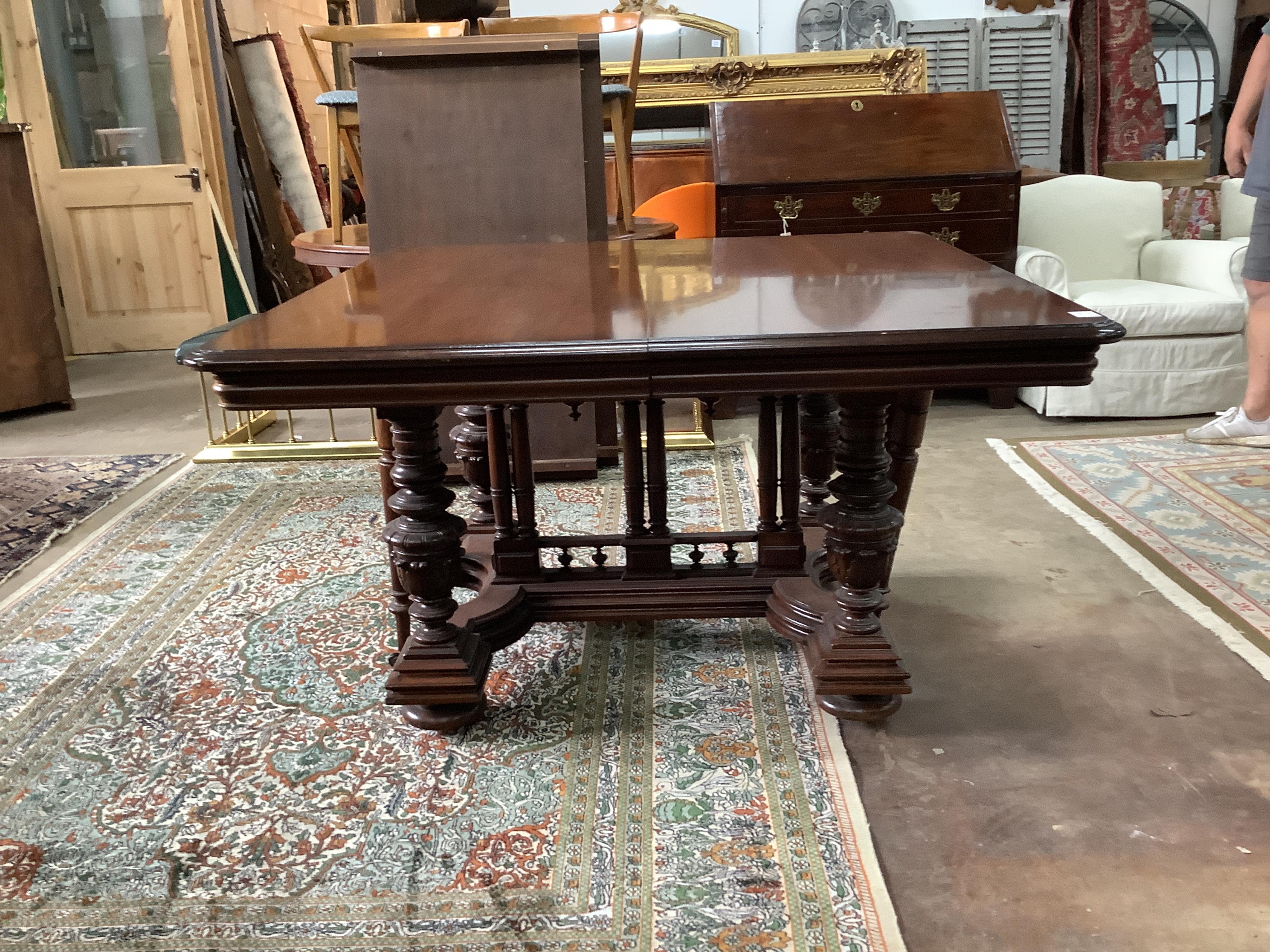 A set of twelve reproduction Chippendale style oak dining chairs, two with arms. Condition - good